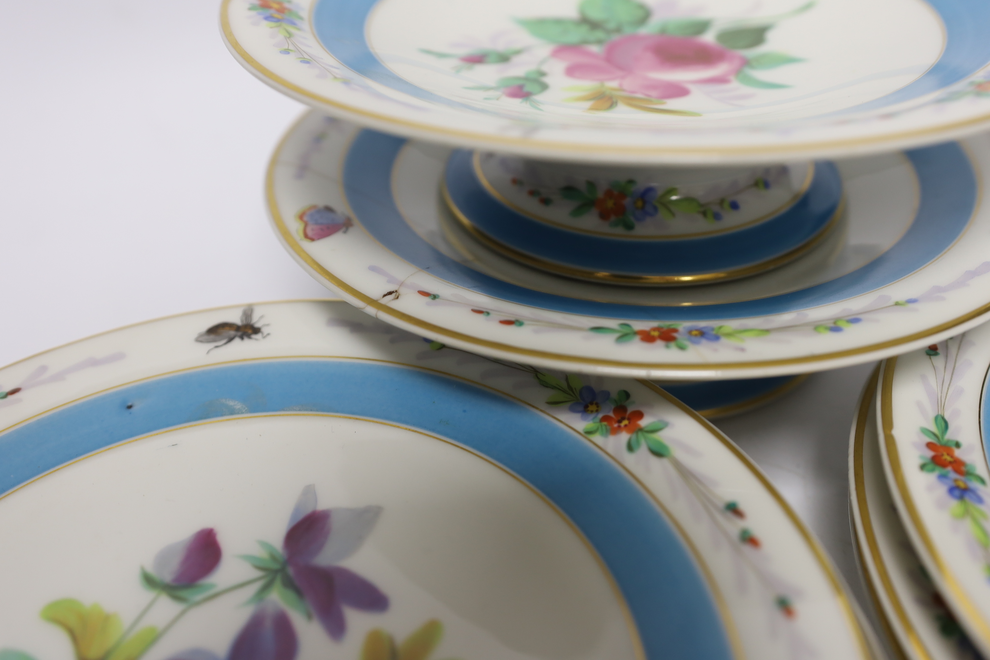 A French mid 19th century floral dessert set, with six plates and two pedestal dishes